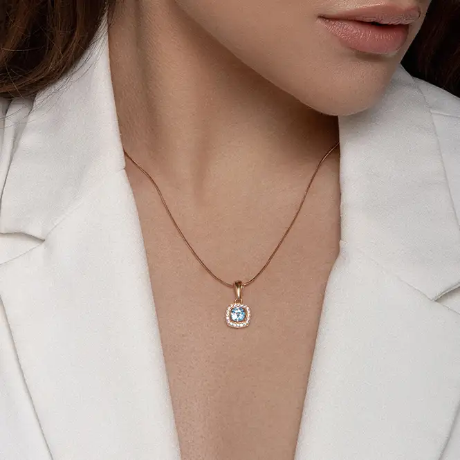 Золотой кулон с топазом и фианитами