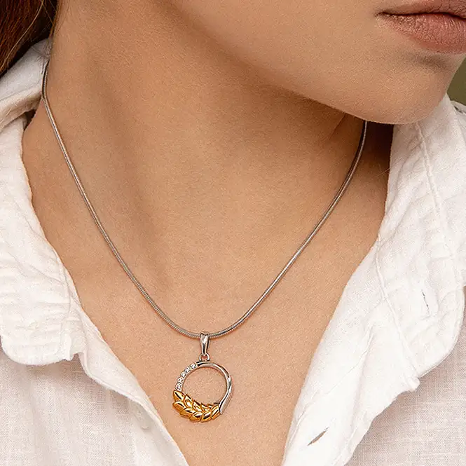 Серебряный кулон с золочением и фианитами