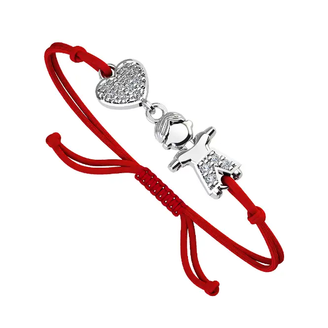 Браслет на нити с серебряными элементами