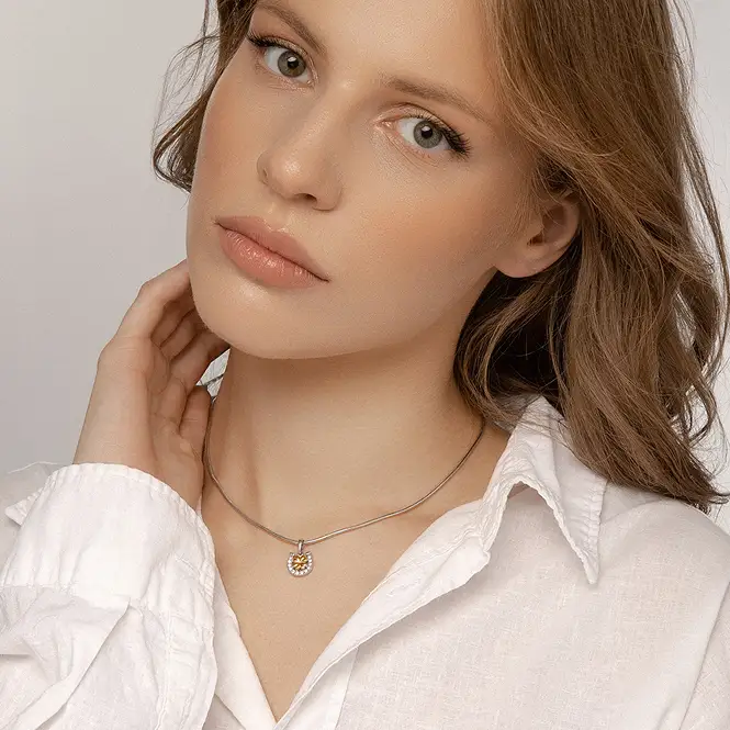 Серебряный кулон с золочением и фианитами