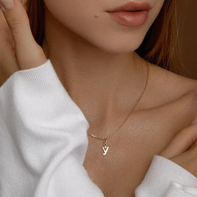 Золотой кулон "Ў"