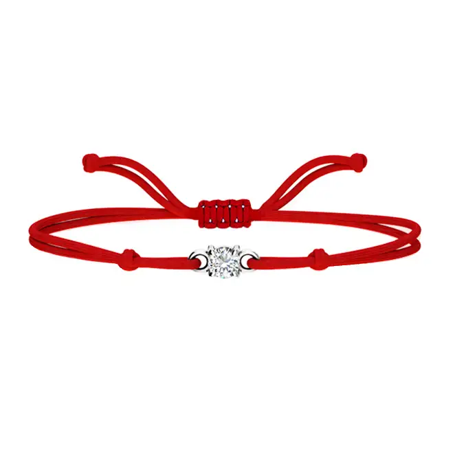 Браслет на нити с серебряным элементом